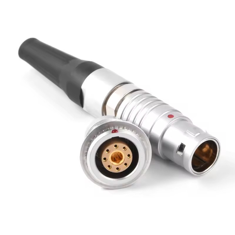 Figure 6 — 6 — A push-pull self-locking circular connector pair (0B class), like those carrying power and signal on the DFCD. Photo via web search (personal-reference use).