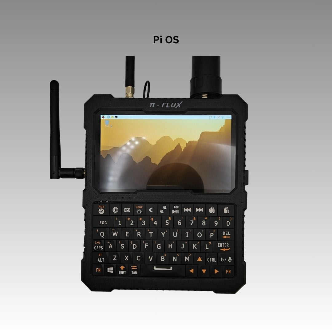 Figure 5 — 5 — Front view with the display active, showing the compact all-in-one footprint and the full keyboard layout. Photo: Carbon Computers, carboncomputers.us.