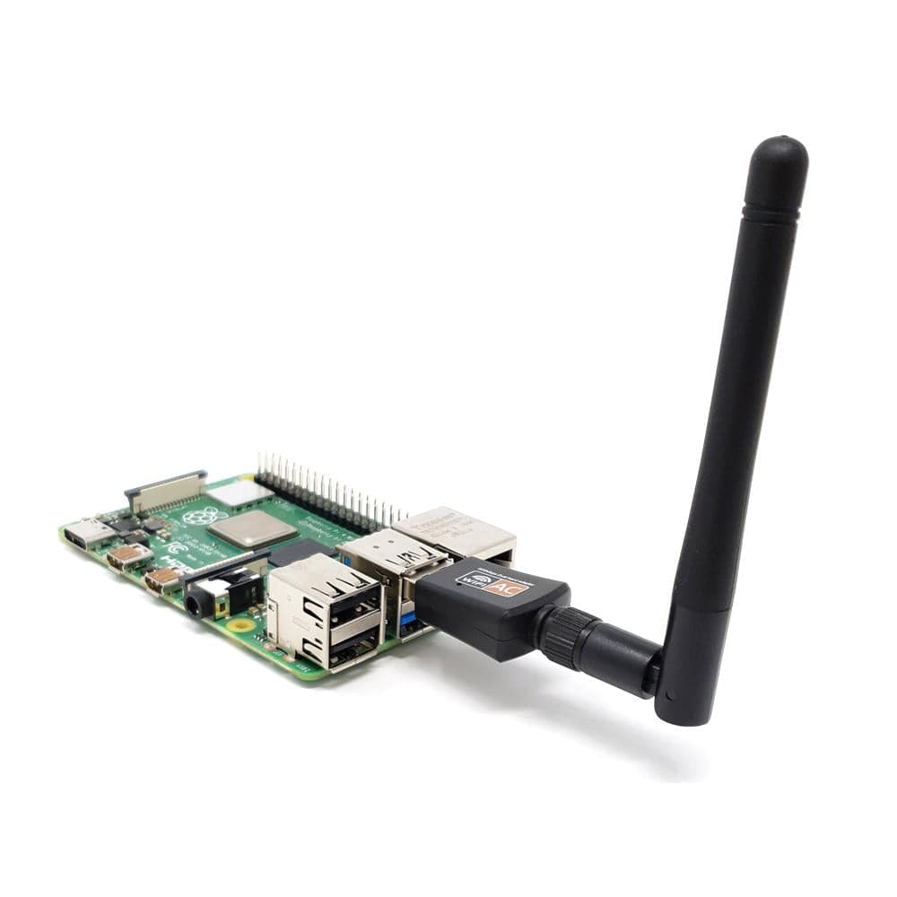 Figure 4 — 4 — A USB Wi-Fi adapter with an external antenna, equivalent to the PiFlux External Wi-Fi Mod. Photo via web search (personal-reference use).